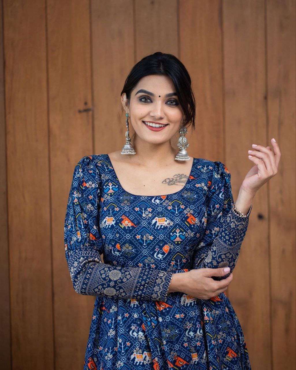 Model in a mustard embroidered outfit